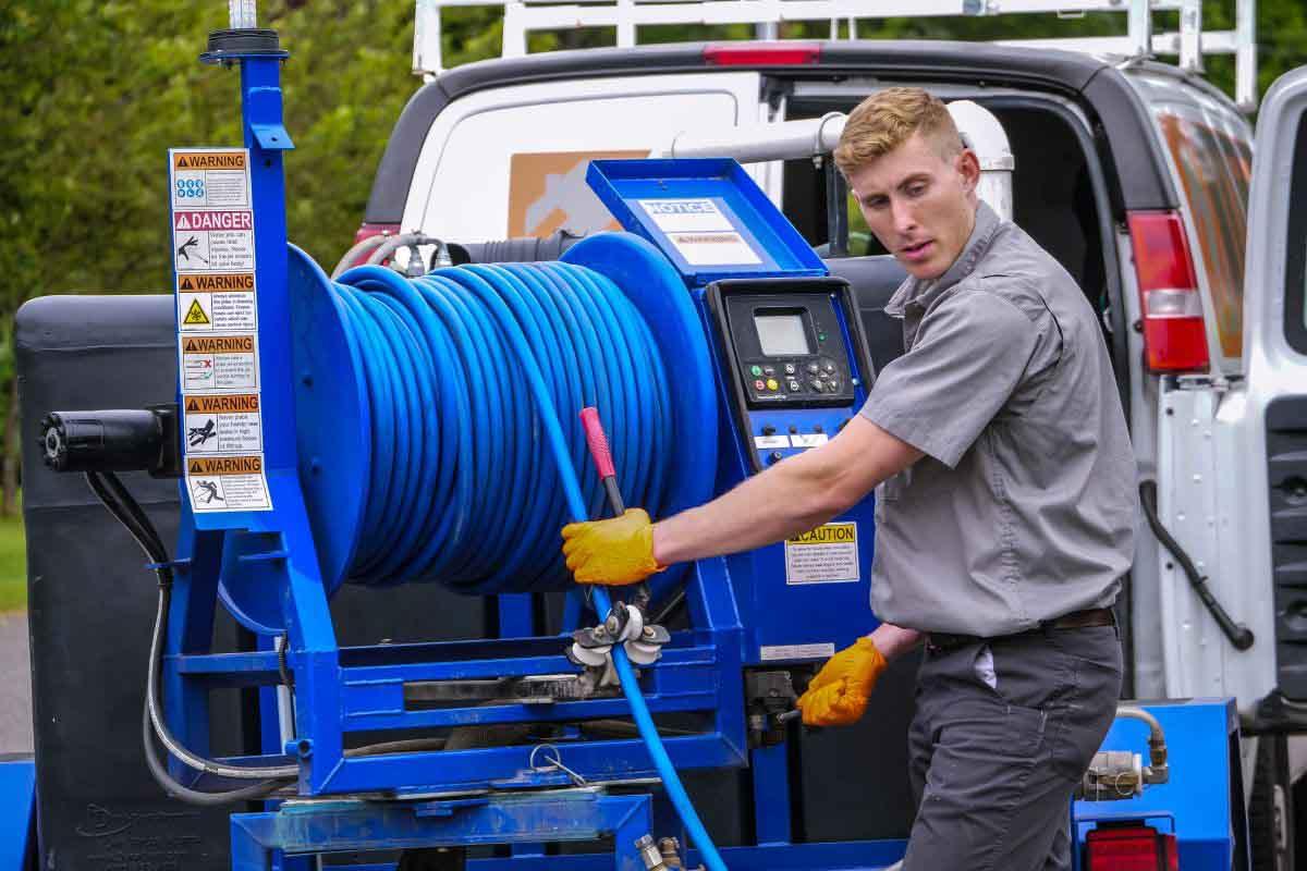 Hydro jetting service setup used to clear grease and buildup linked to a slow kitchen sink